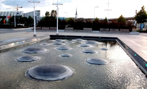 A pool with "boiling" fountains symbolizing the cauldrons of the former tar-boiling plant at the Port of Tallinn