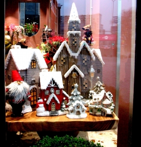 A display case with Christmas gifts